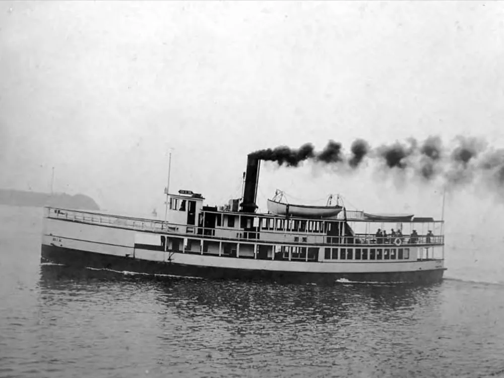 Black and white image of small ferry